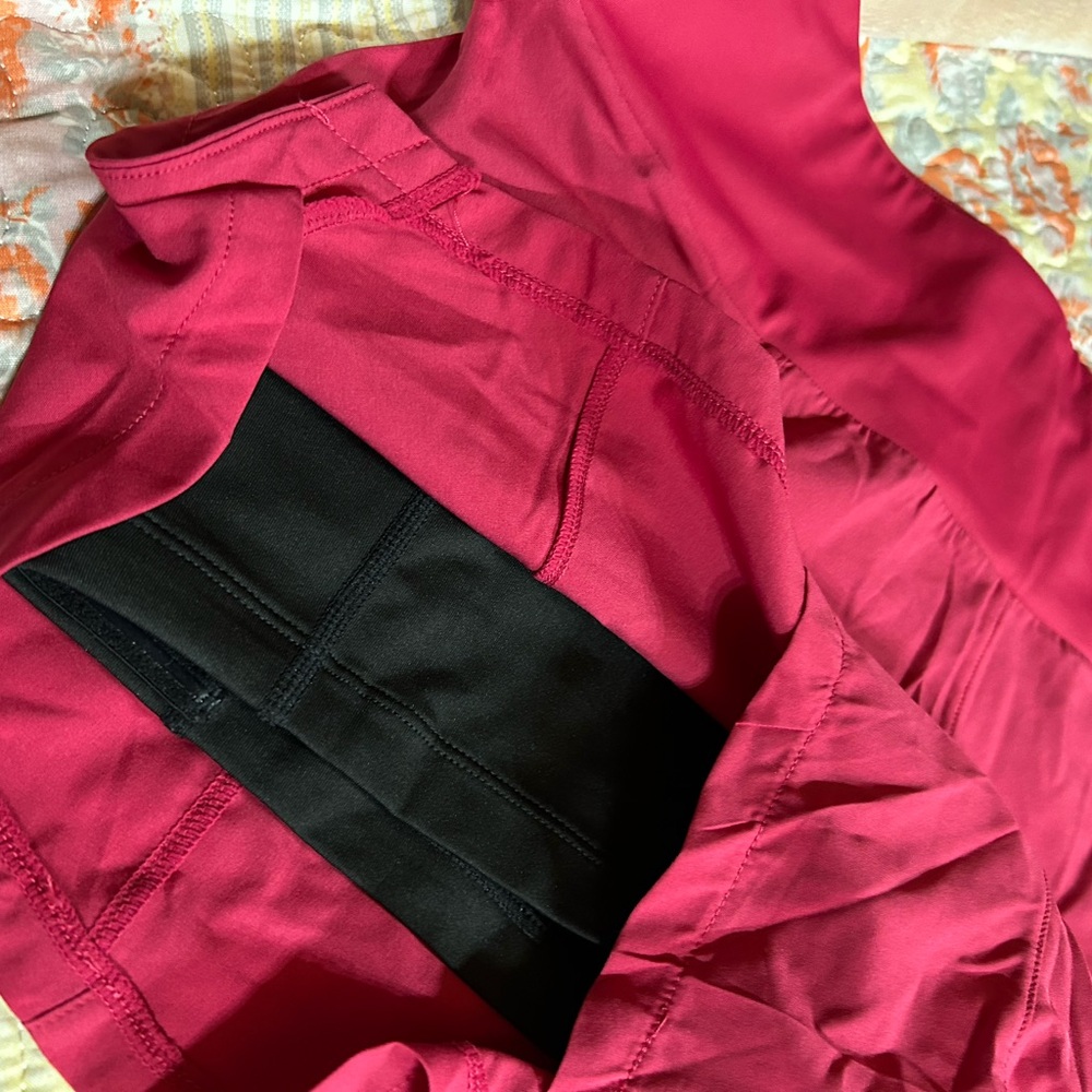 Pink running shorts with built in spandex shorts underneath by CVG never worn